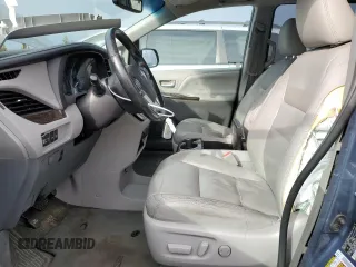 2015 Toyota Sienna XLE with VIN 5TDYK3DC4FS643475, listed as a Copart auction lot 52697405 with 153,808 mi miles and Salvage Title. Bid and sale history available at DreamBid. Image 7.