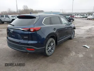 2021 Mazda CX-9 Touring z VIN JM3TCBCY4M0520362, wystawiony jako IAAI lot #41193396 z przebiegiem 17 323 mil mil oraz . Historia ofert i sprzedaży dostępna na DreamBid. Obrazek 4.