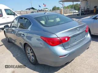 2014 Infiniti Q50 Premium with VIN JN1BV7AP3EM680901, listed as a IAAI auction lot 42143210 with 205,625 mi miles and . Bid and sale history available at carsss.com. Image 3.