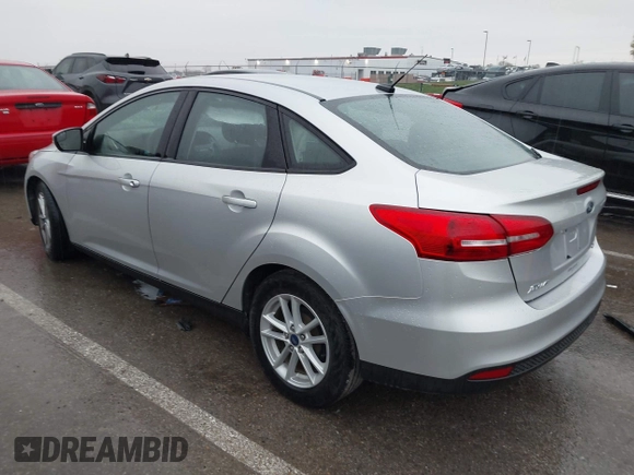 2017 Ford Focus SE with VIN 1FADP3F24HL303600, listed as a IAAI auction lot 41948159 with 95,212 mi miles and . Bid and sale history available at DreamBid. Image 3.