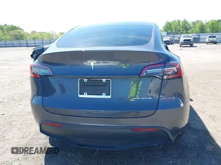 2022 Tesla Model Y Long Range with VIN 7SAYGDEE7NF426404, listed as a IAAI auction lot 42040490 with 39,635 mi miles and . Bid and sale history available at carsss.com. Image 16.