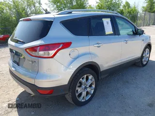 2015 Ford Escape Titanium with VIN 1FMCU9J94FUA65188, listed as a IAAI auction lot 42516728 with 65,969 mi miles and . Bid and sale history available at DreamBid. Image 4.