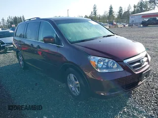 2007 Honda Odyssey EX-L z VIN 5FNRL38737B428660, wystawiony jako IAAI lot #42087846 z przebiegiem 176 479 mil mil oraz . Historia ofert i sprzedaży dostępna na DreamBid. Obrazek 1.