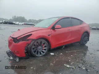 2022 Tesla Model Y Performance z VIN 7SAYGDEF5NF399938, wystawiony jako Copart lot #58766325 z przebiegiem 65 239 mil mil oraz Szkoda całkowita • Salvage title. Historia ofert i sprzedaży dostępna na DreamBid. Obrazek 1.