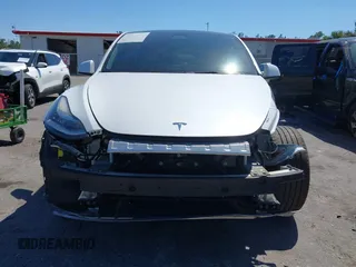 2022 Tesla Model Y Long Range with VIN 7SAYGAEE8NF431786, listed as a IAAI auction lot 41750353 with 67,846 mi miles and . Bid and sale history available at carsss.com. Image 13.