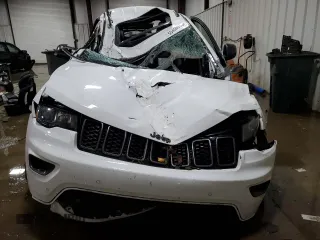 2021 Jeep Grand Cherokee 80th Anniversary z VIN 1C4RJFBG0MC525811, wystawiony jako Copart lot #55459965 z przebiegiem Nie podano mil oraz Szkoda całkowita • Salvage title. Historia ofert i sprzedaży dostępna na DreamBid. Obrazek 5.