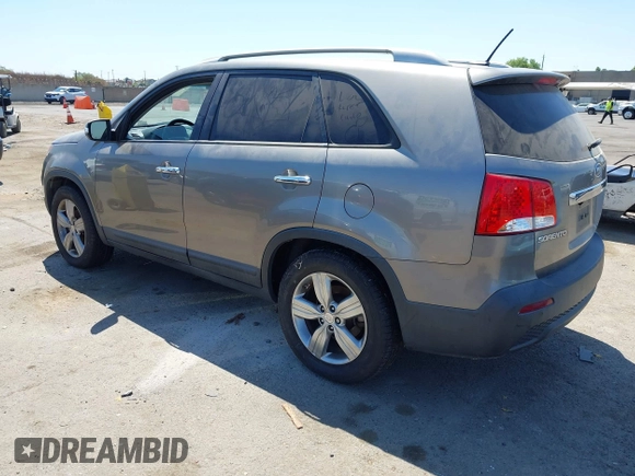 2012 Kia Sorento EX with VIN 5XYKU3A60CG305675, listed as a IAAI auction lot 42647223 with 174,447 mi miles and . Bid and sale history available at DreamBid. Image 3.
