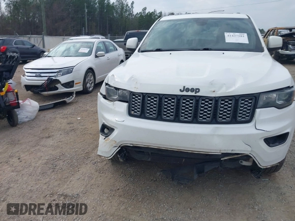 2017 Jeep Grand Cherokee Altitude with VIN 1C4RJEAG9HC736362, listed as a IAAI auction lot 41437181 with 125,346 mi miles and . Bid and sale history available at DreamBid. Image 13.