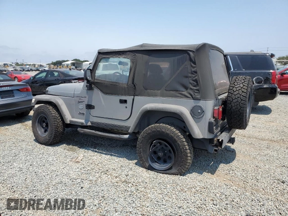 2001 Jeep Wrangler Sport с VIN 1J4FA49S41P353878, выставлен на аукционе Copart как лот 64637385 с пробегом 166 642 миль миль и Списание • Salvage title. История ставок и продаж доступна на DreamBid. Изображение 2.