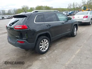 2015 Jeep Cherokee Limited with VIN 1C4PJMDB9FW680565, listed as a IAAI auction lot 42134052 with 192,728 mi miles. Bid and sale history available at carsss.com. Image 4.