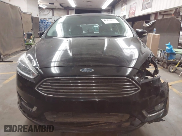 2017 Ford Focus Titanium with VIN 1FADP3N24HL272396, listed as a IAAI auction lot 41852208 with 92,945 mi miles and . Bid and sale history available at carsss.com. Image 13.