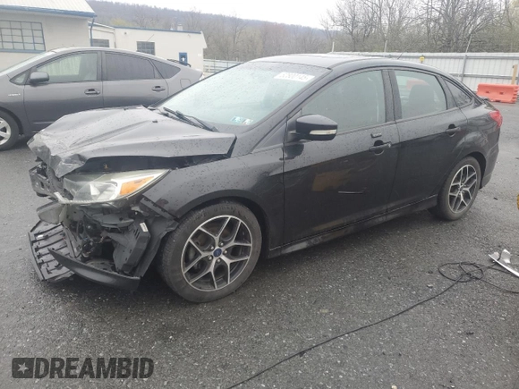 2015 Ford Focus SE with VIN 1FADP3F24FL251916, listed as a Copart auction lot 52800145 with 131,862 mi miles and Salvage Title. Bid and sale history available at DreamBid. Image 1.