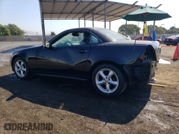 2002 Mercedes-Benz SLK-Class 3.2L with VIN WDBKK65F12F254172, listed as a Copart auction lot 74336334 with 148,405 mi miles and Salvage Title. Bid and sale history available at carsss.com. Image 2.