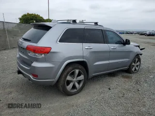 2015 Jeep Grand Cherokee Overland with VIN 1C4RJECG4FC808241, listed as a Copart auction lot 59699685 with 67,542 mi miles and Salvage title. Bid and sale history available at DreamBid. Image 3.