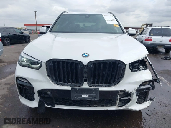 2020 BMW X5 sDrive40i with VIN 5UXCR4C04L9D41635, listed as a IAAI auction lot 42201174 with 64,989 mi miles and . Bid and sale history available at DreamBid. Image 12.