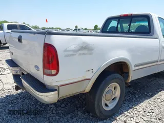 1997 Ford F-150 with VIN 1FTEF18L2VNC06150, listed as a IAAI auction lot 42051728 with Not provided miles and . Bid and sale history available at DreamBid. Image 6.