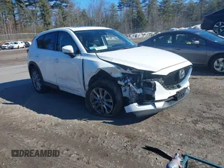 2019 Mazda CX-5 Grand Touring with VIN JM3KFBDM2K0672720, listed as a IAAI auction lot 41751196 with 51,632 mi miles and . Bid and sale history available at carsss.com. Image 1.