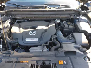 2022 Mazda CX-5 2.5 Turbo with VIN JM3KFBAY4N0534690, listed as a IAAI auction lot 41716988 with 23,910 mi miles and . Bid and sale history available at carsss.com. Image 10.