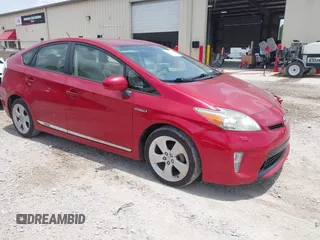 2013 Toyota Prius One z VIN JTDKN3DU9D1683891, wystawiony jako IAAI lot #42458187 z przebiegiem 284 914 mil mil oraz . Historia ofert i sprzedaży dostępna na DreamBid. Obrazek 1.