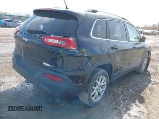 2016 Jeep Cherokee Latitude with VIN 1C4PJLCB9GW362961, listed as a IAAI auction lot 42113135 with 148,748 mi miles and . Bid and sale history available at DreamBid. Image 4.