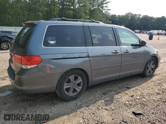2010 Honda Odyssey Touring с VIN 5FNRL3H93AB087771, выставлен на аукционе Copart как лот 59322835 с пробегом 247 000 миль миль и Чистый • Clean title. История ставок и продаж доступна на DreamBid. Изображение 3.