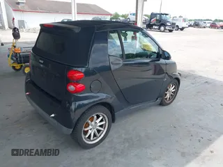 2009 Smart fortwo Passion with VIN WMEEK31X19K294234, listed as a IAAI auction lot 42225528 with 85,905 mi miles and . Bid and sale history available at DreamBid. Image 4.
