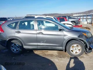 2014 Honda CR-V LX with VIN 2HKRM4H39EH634676, listed as a IAAI auction lot 41233279 with 153,761 mi miles and . Bid and sale history available at carsss.com. Image 14.
