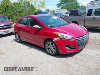 2014 Hyundai Elantra GT with VIN KMHD35LH9EU234401, listed as a IAAI auction lot 39942729 with 122,894 mi miles. Bid and sale history available at carsss.com. Image 1.