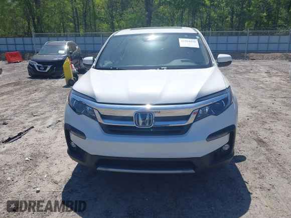 2019 Honda Pilot EX-L with VIN 5FNYF5H57KB038019, listed as a IAAI auction lot 41994410 with 126,738 mi miles and . Bid and sale history available at carsss.com. Image 13.