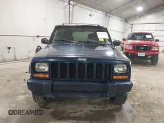2000 Jeep Cherokee Classic with VIN 1J4FF58SXYL142372, listed as a IAAI auction lot 41820743 with 131,526 mi miles. Bid and sale history available at carsss.com. Image 6.