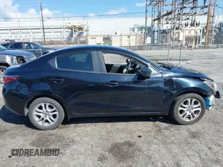 2016 Scion iA z VIN 3MYDLBZV0GY123351, wystawiony jako IAAI lot #41736327 z przebiegiem 86 804 mil mil oraz . Historia ofert i sprzedaży dostępna na DreamBid. Obrazek 13.