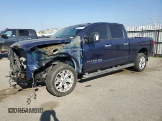 2017 Nissan Titan SL z VIN 1N6BA1F22HN511547, wystawiony jako Copart lot #89351355 z przebiegiem 85 385 mil mil oraz Szkoda całkowita • Salvage title. Historia ofert i sprzedaży dostępna na DreamBid. Obrazek 1.