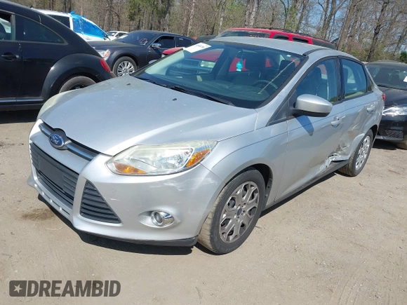 2012 Ford Focus SE with VIN 1FAHP3F29CL377721, listed as a IAAI auction lot 41848786 with 147,709 mi miles. Bid and sale history available at carsss.com. Image 2.