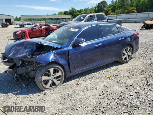 2019 Kia Optima LX z VIN 5XXGT4L31KG289703, wystawiony jako Copart lot #57663005 z przebiegiem 126 689 mil mil oraz Szkoda całkowita • Salvage title. Historia ofert i sprzedaży dostępna na DreamBid. Obrazek 1.
