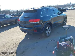 2014 Jeep Grand Cherokee Limited with VIN 1C4RJFBM8EC298326, listed as a IAAI auction lot 41307009 with 122,663 mi miles. Bid and sale history available at carsss.com. Image 4.
