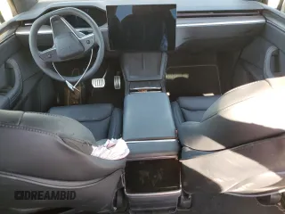 2023 Tesla Model X with VIN 7SAXCDE5XPF422163, listed as a Copart auction lot 52573185 with Not Provided miles and Salvage Title. Bid and sale history available at DreamBid. Image 8.