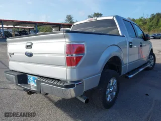 2013 Ford F-150 XL with VIN 1FTFW1CT9DKD02756, listed as a IAAI auction lot 40759592 with 218,975 mi miles. Bid and sale history available at carsss.com. Image 4.