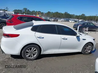 2016 Kia Optima LX with VIN KNAGT4L39G5073865, listed as a IAAI auction lot 41675211 with 120,751 mi miles. Bid and sale history available at carsss.com. Image 13.