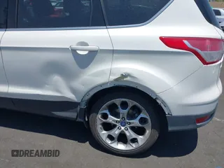 2015 Ford Escape Titanium с VIN 1FMCU0J92FUB25268, выставлен на аукционе IAAI как лот 42489681 с пробегом 139 809 миль миль и . История ставок и продаж доступна на DreamBid. Изображение 6.