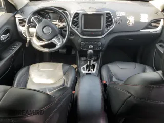2015 Jeep Cherokee Trailhawk z VIN 1C4PJMBS5FW778852, wystawiony jako Copart lot #59107555 z przebiegiem Nie podano mil oraz Czysty tytuł • Clean title. Historia ofert i sprzedaży dostępna na DreamBid. Obrazek 8.