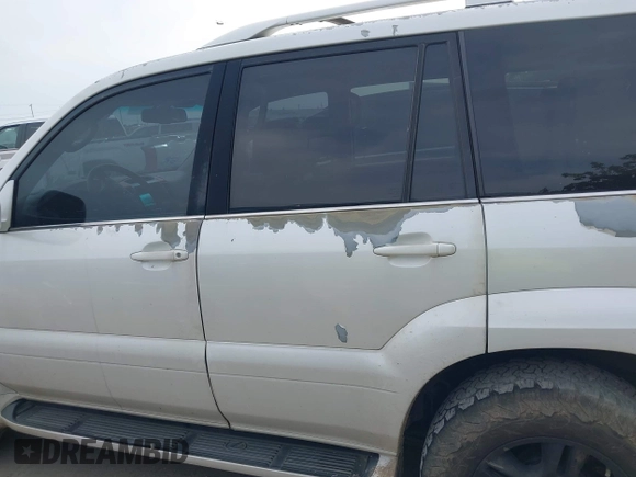 2007 Lexus GX 470 z VIN JTJBT20X570148905, wystawiony jako IAAI lot #42025227 z przebiegiem 293 379 mil mil oraz . Historia ofert i sprzedaży dostępna na DreamBid. Obrazek 14.