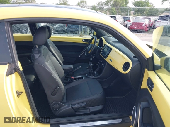 2013 Volkswagen Beetle with VIN 3VWHX7AT0DM603661, listed as a IAAI auction lot 42464030 with 95,159 mi miles and . Bid and sale history available at DreamBid. Image 5.