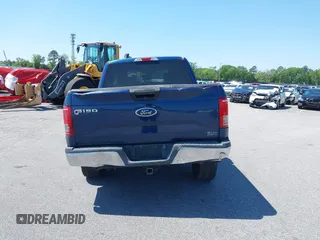 2015 Ford F-150 XLT with VIN 1FTEW1EP3FKF22540, listed as a IAAI auction lot 39565229 with 127,825 mi miles. Bid and sale history available at carsss.com. Image 15.