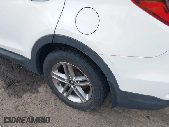 2018 Hyundai Santa Fe 2.4L z VIN 5XYZUDLB1JG543837, wystawiony jako IAAI lot #42235471 z przebiegiem 157 909 mil mil oraz . Historia ofert i sprzedaży dostępna na DreamBid. Obrazek 6.