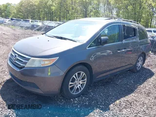 2012 Honda Odyssey EX-L with VIN 5FNRL5H69CB067867, listed as a IAAI auction lot 42225228 with Not provided miles and . Bid and sale history available at DreamBid. Image 2.