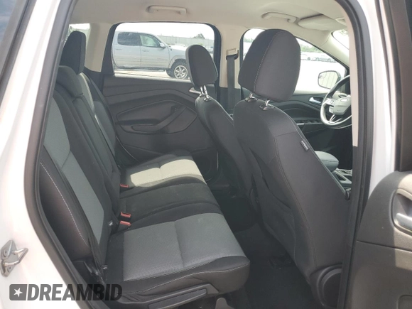 2017 Ford Escape SE z VIN 1FMCU0GD9HUE38848, wystawiony jako Copart lot #56859745 z przebiegiem 69 404 mil mil oraz Szkoda całkowita • Salvage title. Historia ofert i sprzedaży dostępna na DreamBid. Obrazek 11.