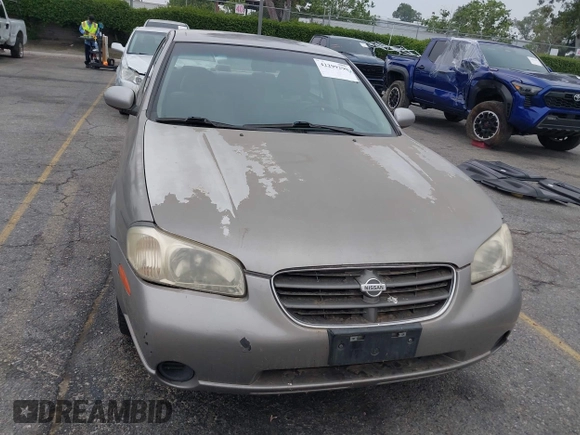 2000 Nissan Maxima GXE z VIN JN1CA31D0YT754624, wystawiony jako IAAI lot #42299290 z przebiegiem 81 958 mil mil oraz . Historia ofert i sprzedaży dostępna na DreamBid. Obrazek 12.