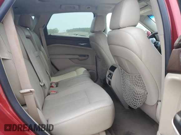 2012 Cadillac SRX Luxury Collection z VIN 3GYFNAE33CS541684, wystawiony jako Copart lot #57157985 z przebiegiem 158 068 mil mil oraz Szkoda całkowita • Salvage title. Historia ofert i sprzedaży dostępna na DreamBid. Obrazek 11.