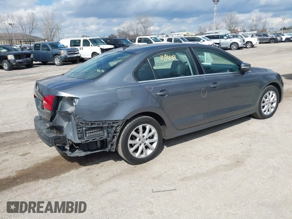 2013 Volkswagen Jetta Sedan SE with VIN 3VWDP7AJ0DM280614, listed as a IAAI auction lot 41882868 with 142,363 mi miles. Bid and sale history available at carsss.com. Image 4.