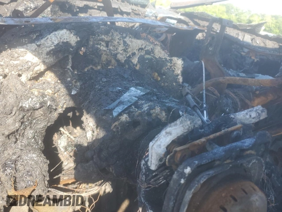 2003 Chevrolet Tahoe LS z VIN 1GNEC13Z03J273863, wystawiony jako Copart lot #56574255 z przebiegiem Nie podano mil oraz Szkoda całkowita • Salvage title. Historia ofert i sprzedaży dostępna na DreamBid. Obrazek 9.